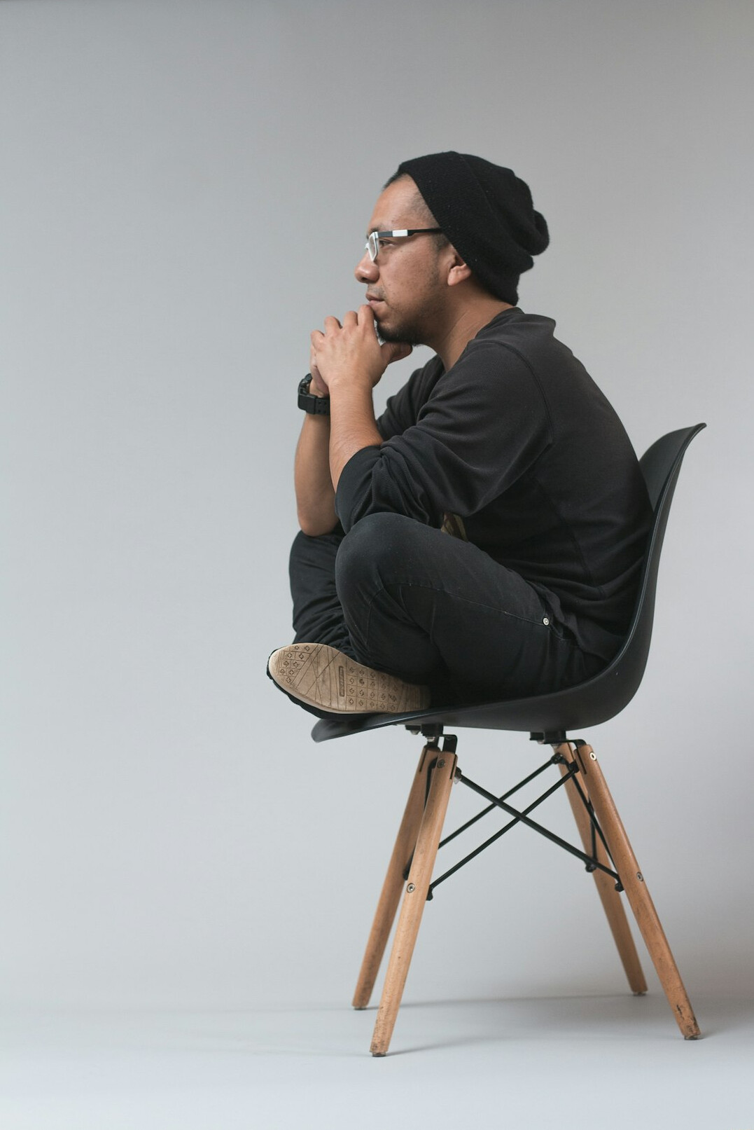 person sitting confidently in meeting